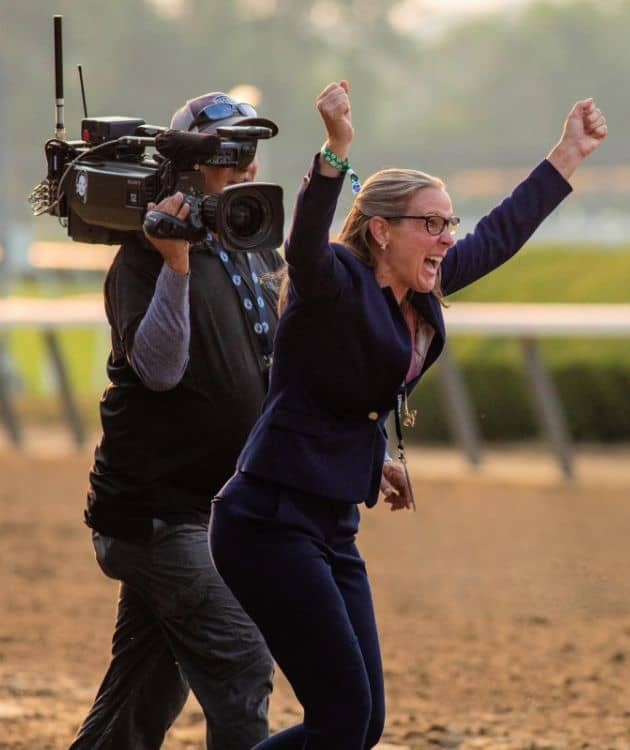 Jena Antonucci celebrates Arcangelo’s 2023 Belmont Stakes victory as media capture the historic Triple Crown race win.